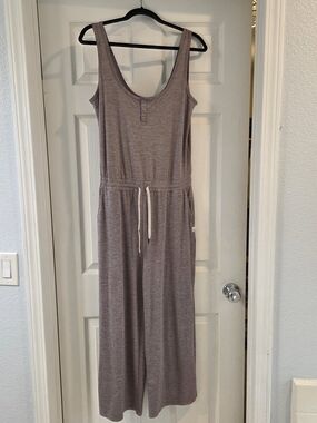 Vuori Women's Sleeveless Henley Jumpsuit in Heather Mauve